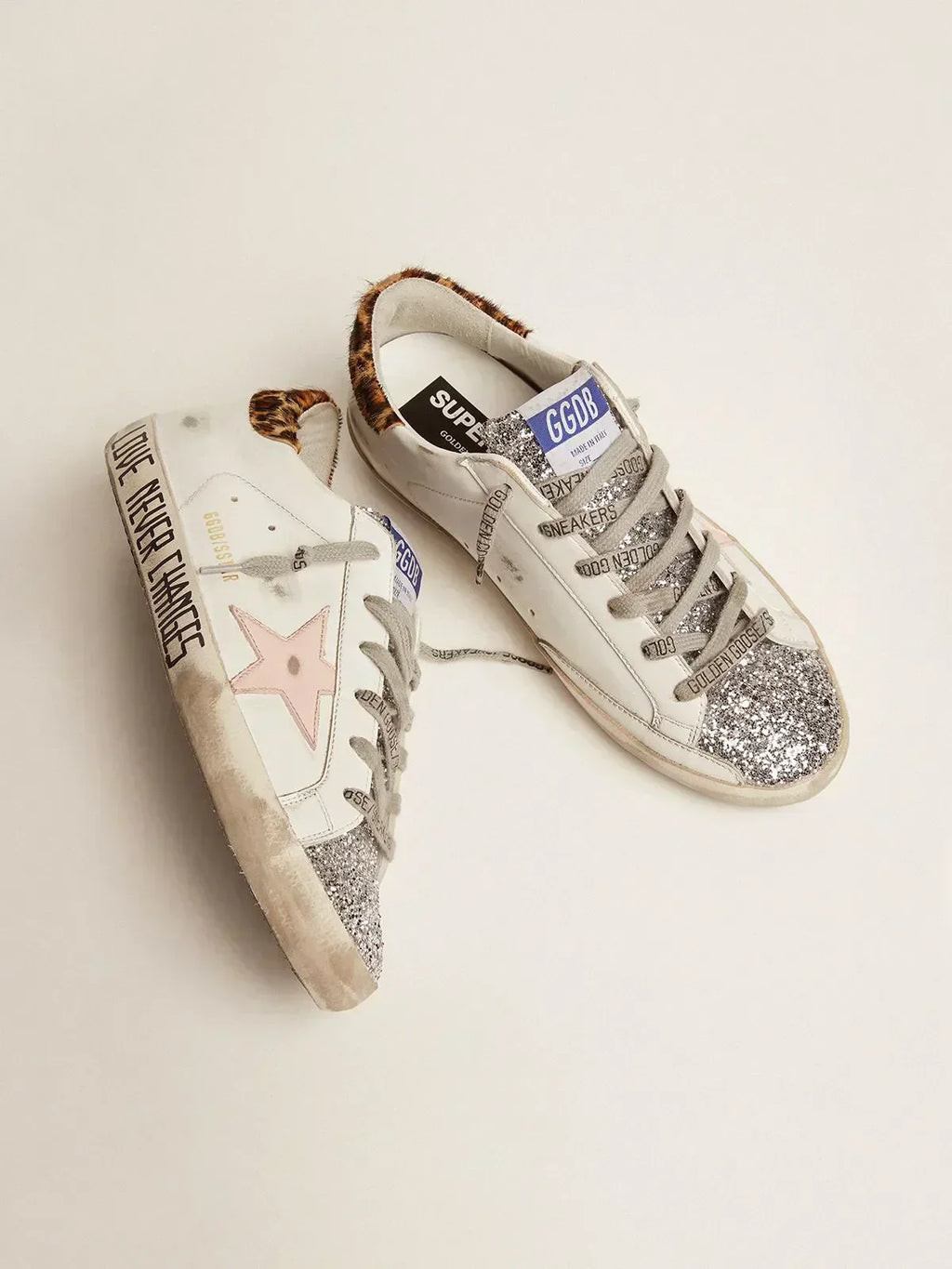 Super-Star sneakers with silver glitter tongue and handwritten lettering on the foxing