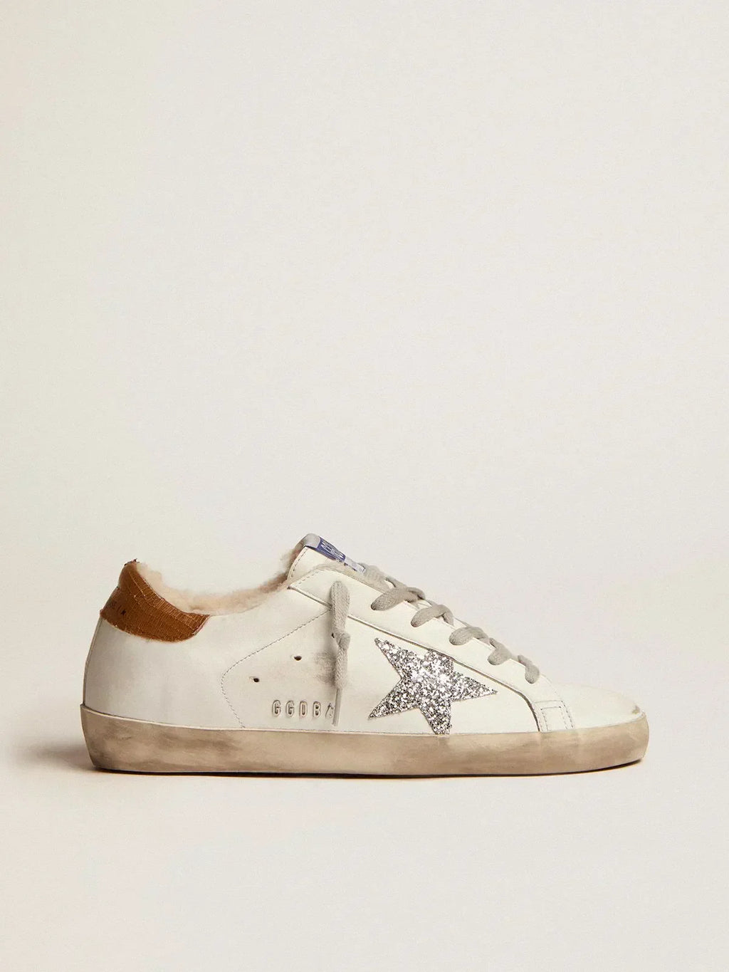 Super-Star sneakers with shearling lining. silver glitter star and lizard-print dove-gray leather heel tab