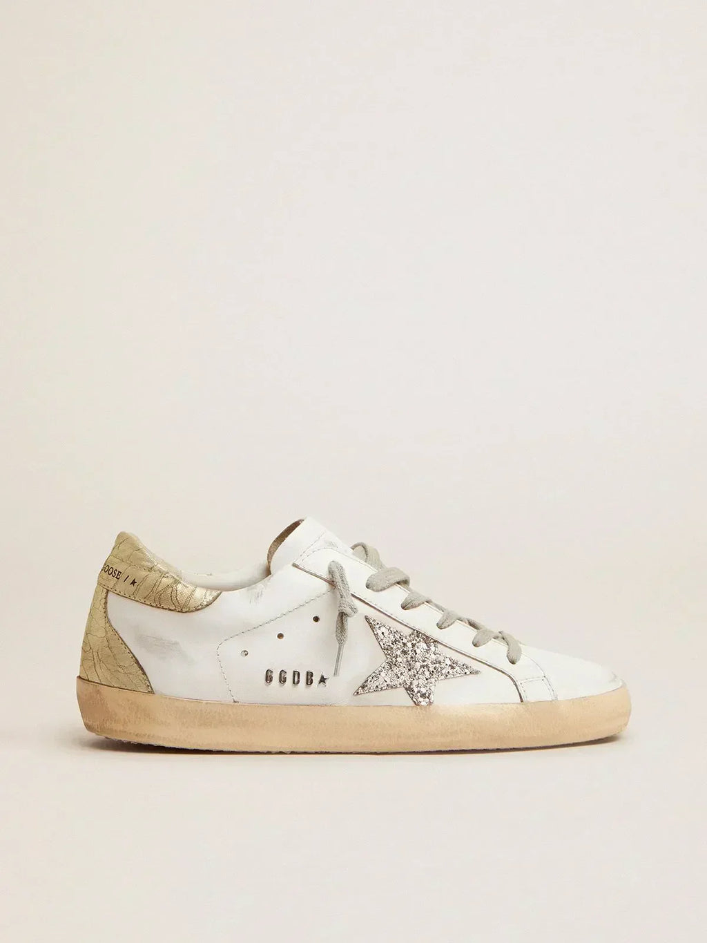 Super-Star sneakers with silver glitter star and glossy gold leather heel tab
