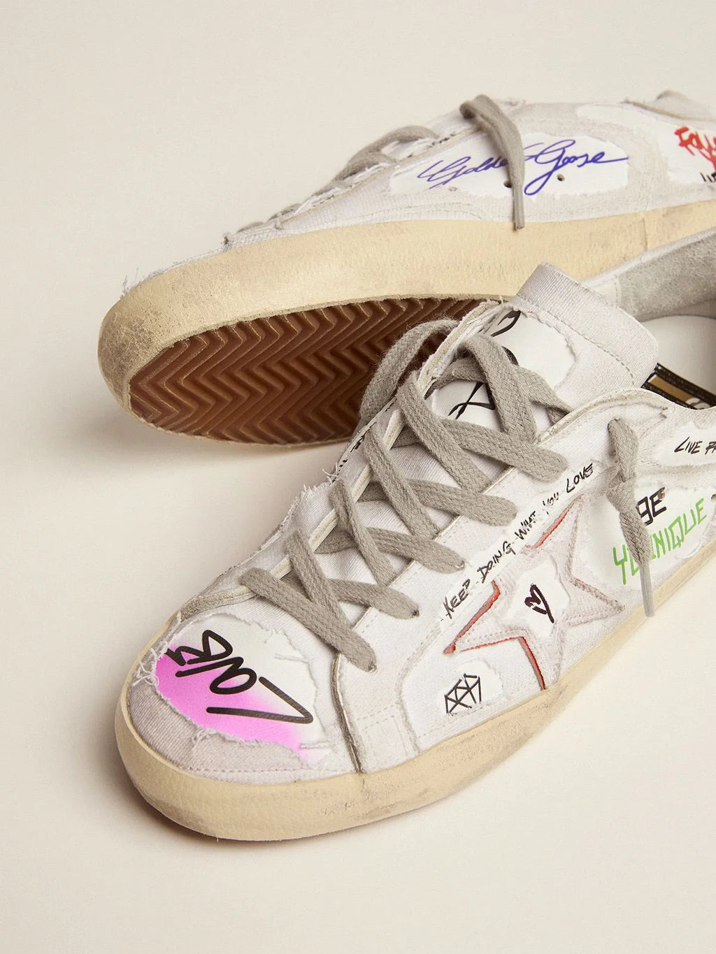 Super-Star Dream Maker sneakers in white color with reverse construction and hidden multicolor details