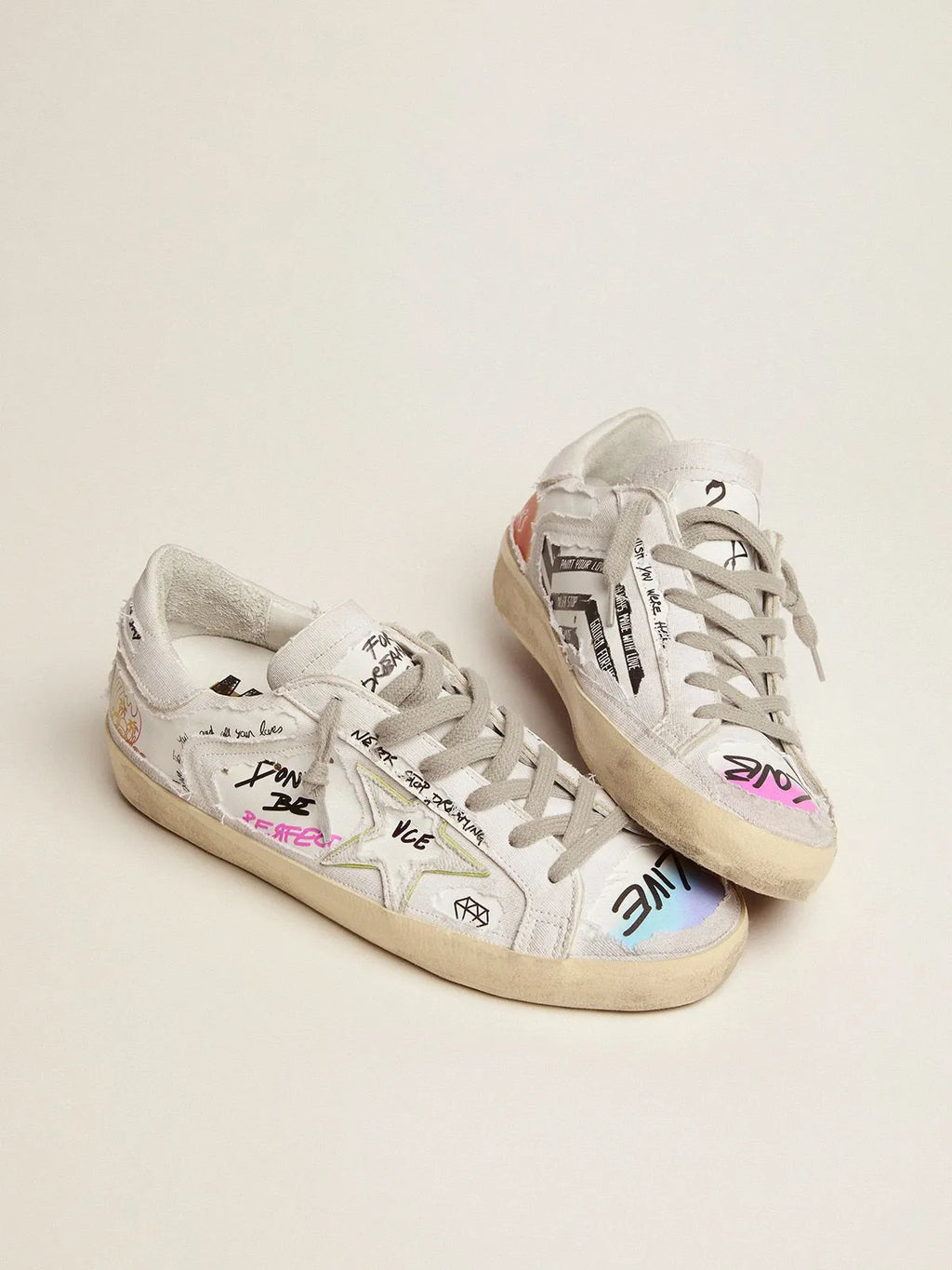 Super-Star Dream Maker sneakers in white color with reverse construction and hidden multicolor details