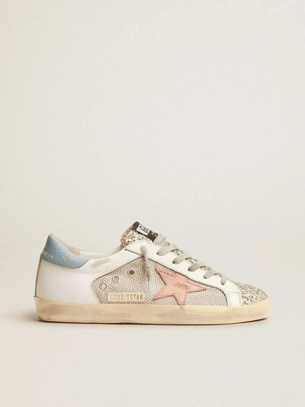 Sneakers Super-Star LTD in pelle bianca con inserto in mesh e linguetta glitter argento 