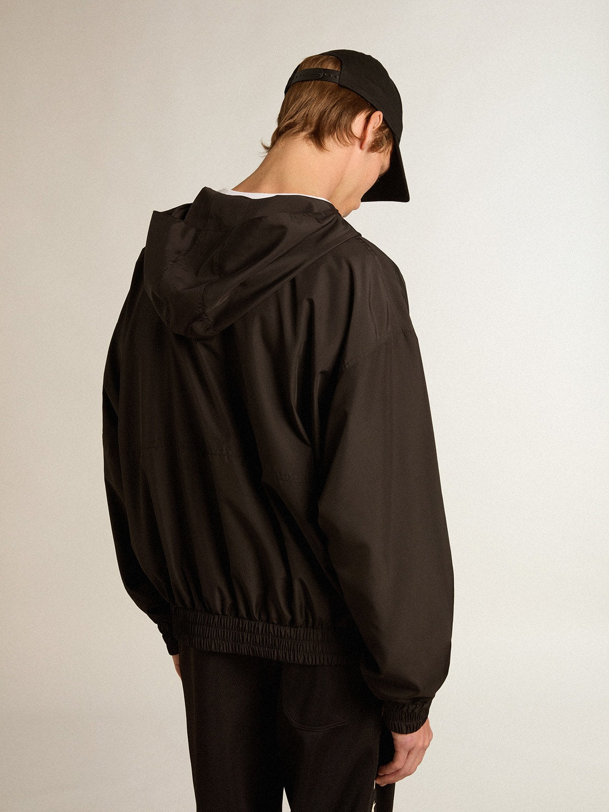 Black windbreaker with hood