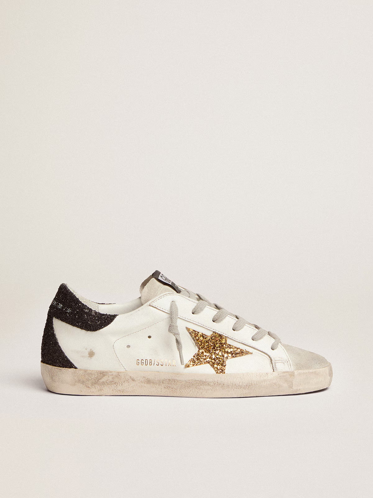 Women's Super-Star LTD with gold star and black glitter heel tab