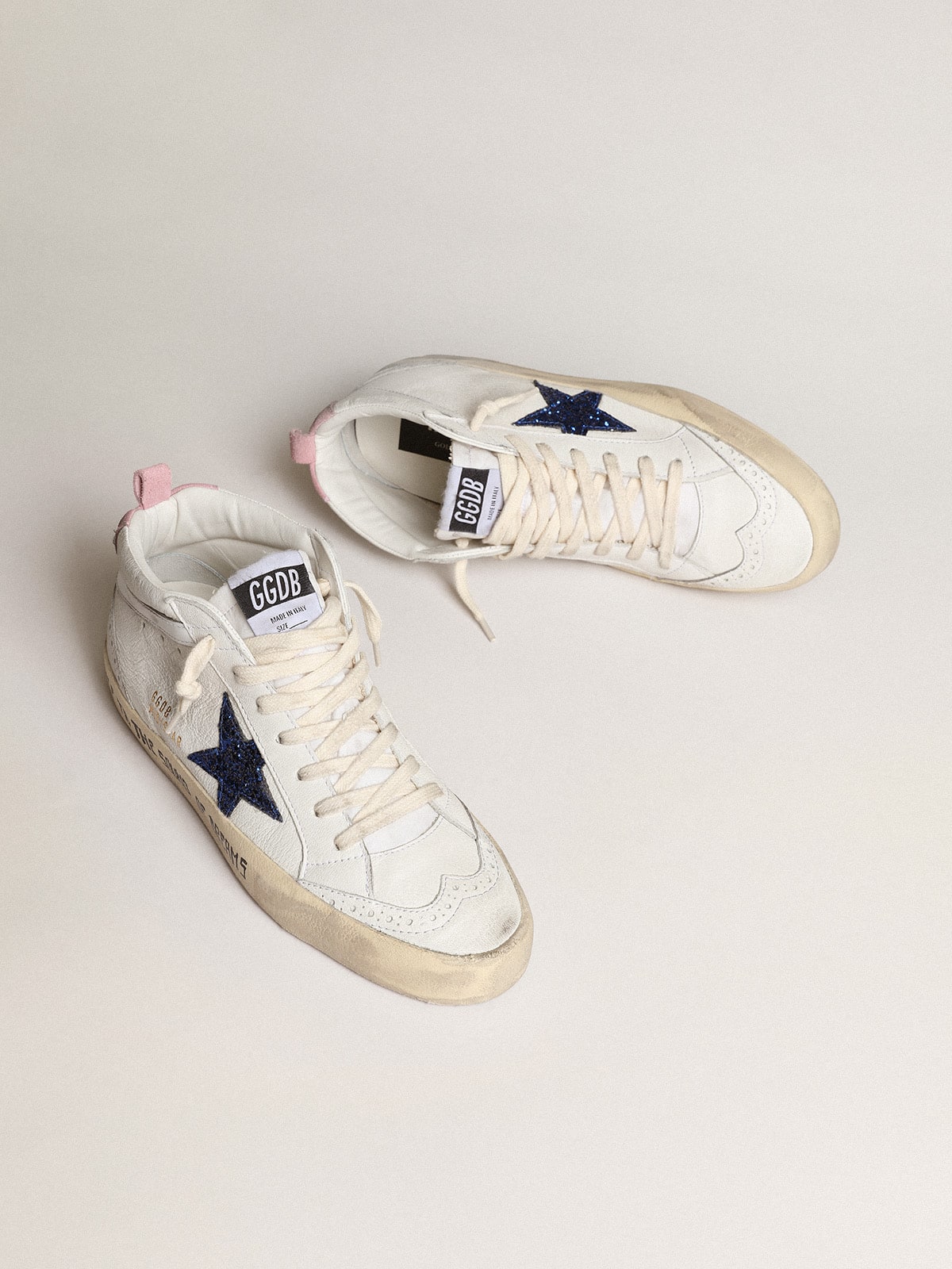 Mid Star with blue glitter star and pink suede heel tab