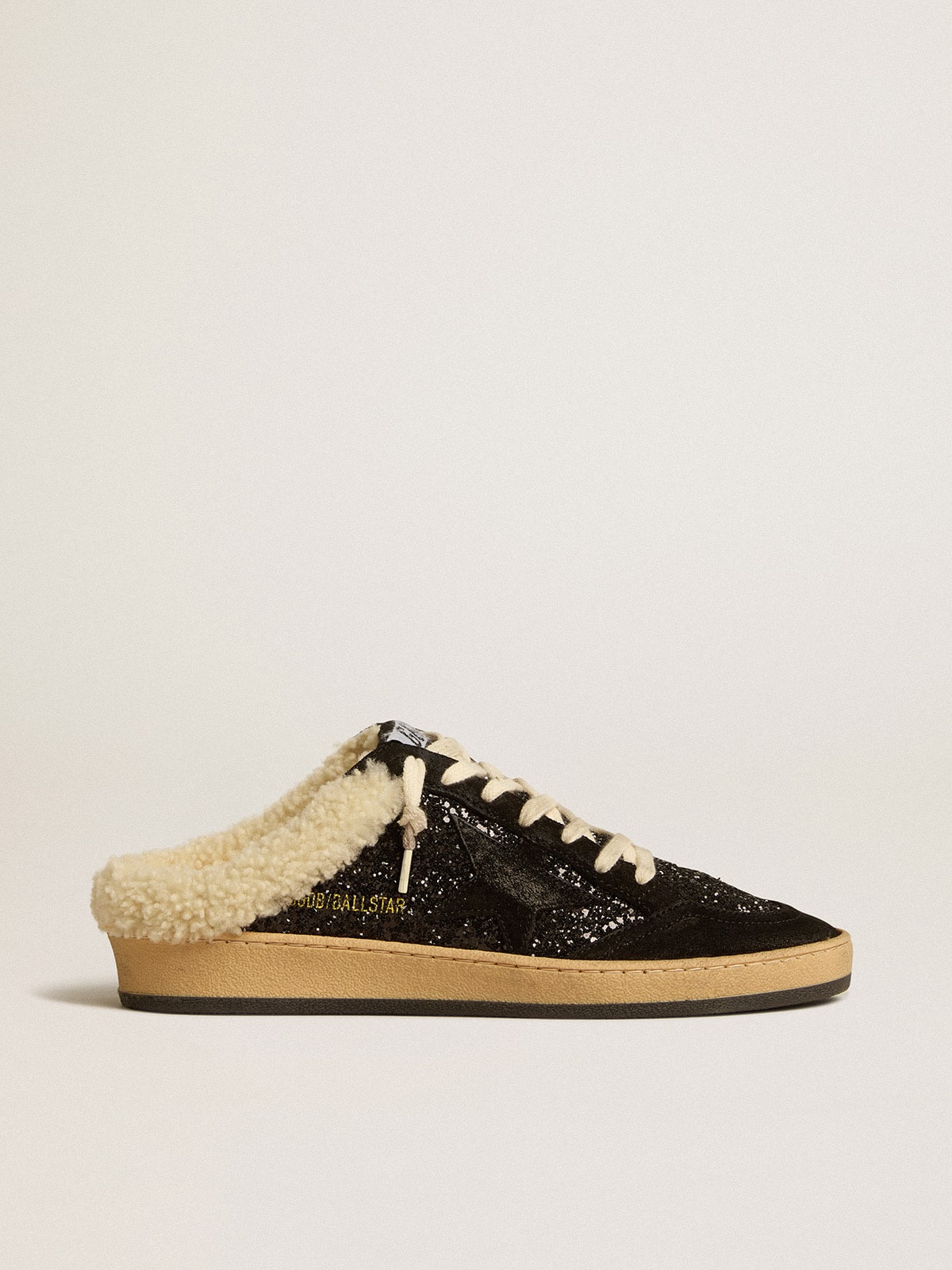 Sabot Ball Star in glitter nero con stella nera e fodera in shearling
