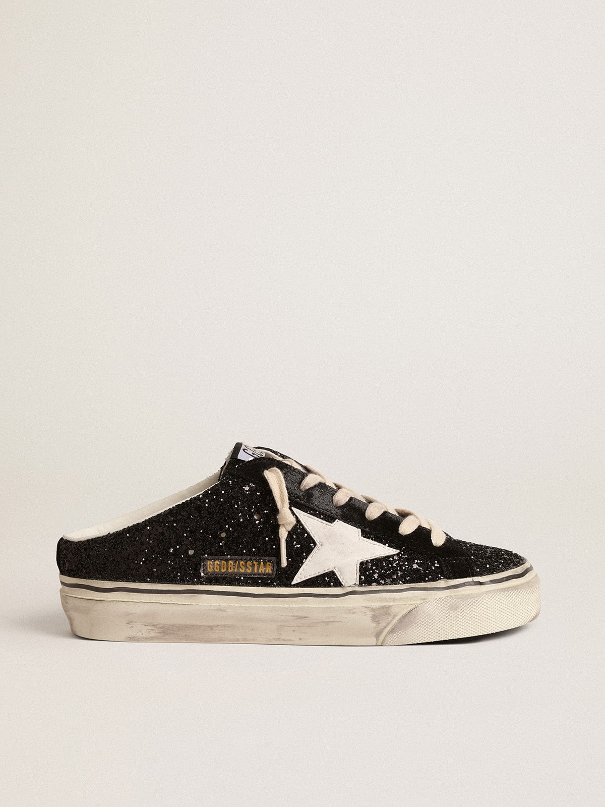 Sabot Super-Star in glitter nero con stella bianca bio-based