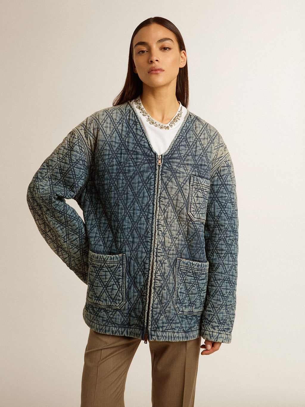 Women's blue quilted jacket in cotton denim with distressed finish
