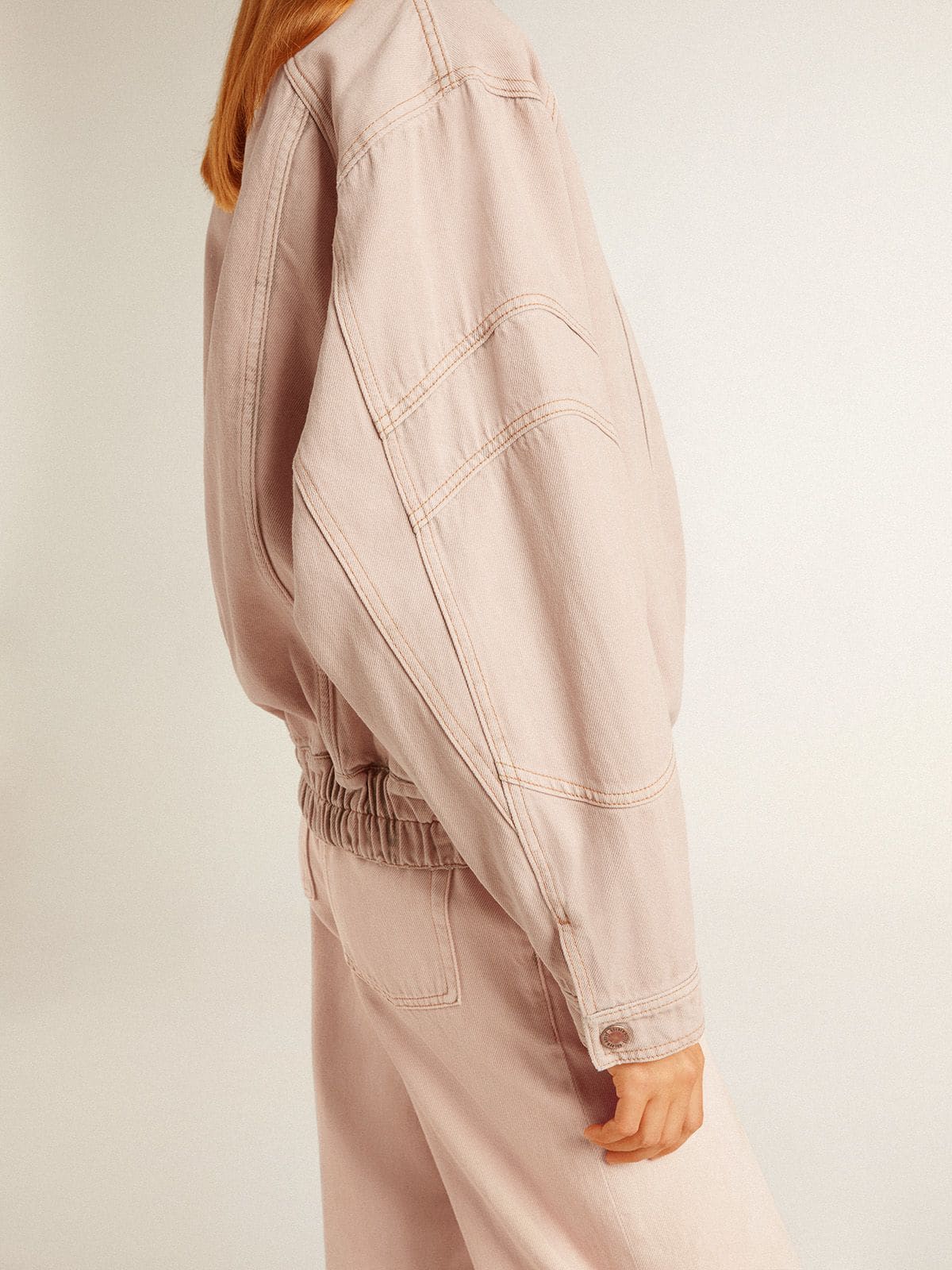 Women's pink dyed denim bomber jacket